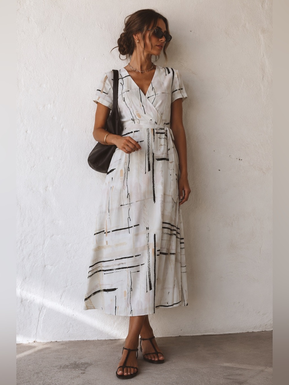 Aritzia Babaton Wrap dress perfect for summer. Feminine light wear midi Dress
